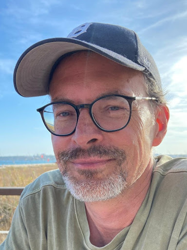 Professional portrait of an experienced software engineer